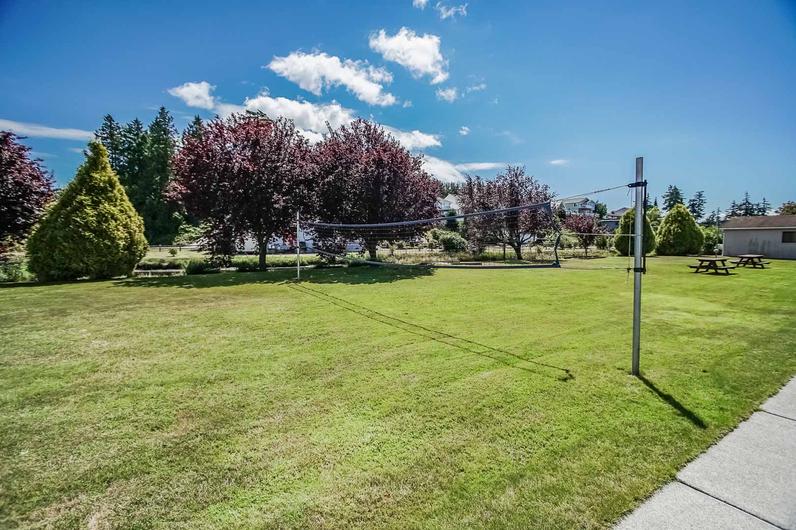 A volleyball net on the grass area at VRI's Cabana Club in Blaine, Washington.